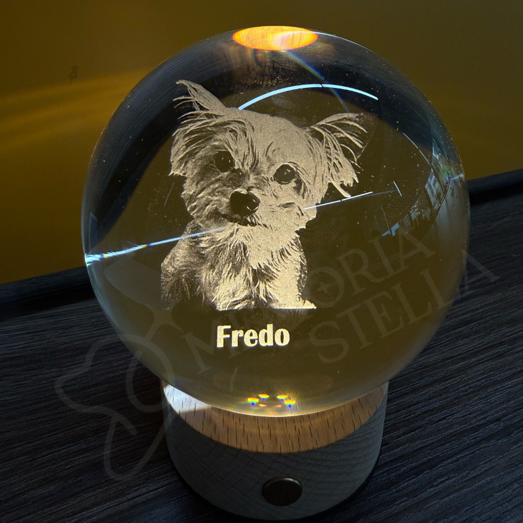 Laser engraving micro-points inside crystal sphere with warm light testing