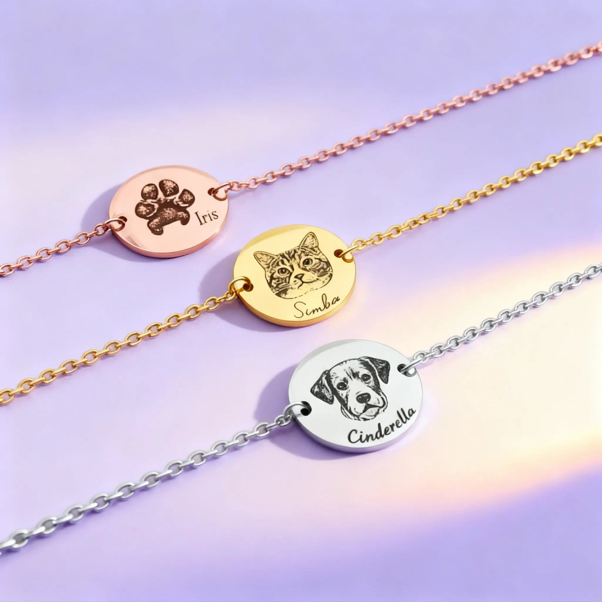 Gold, rose-gold, and silver pet portrait bracelets — paw, cat, and dog engraved disc charms