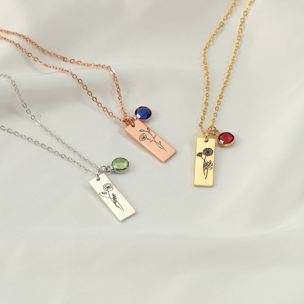 ertical bar name pendant with January birthstone charm