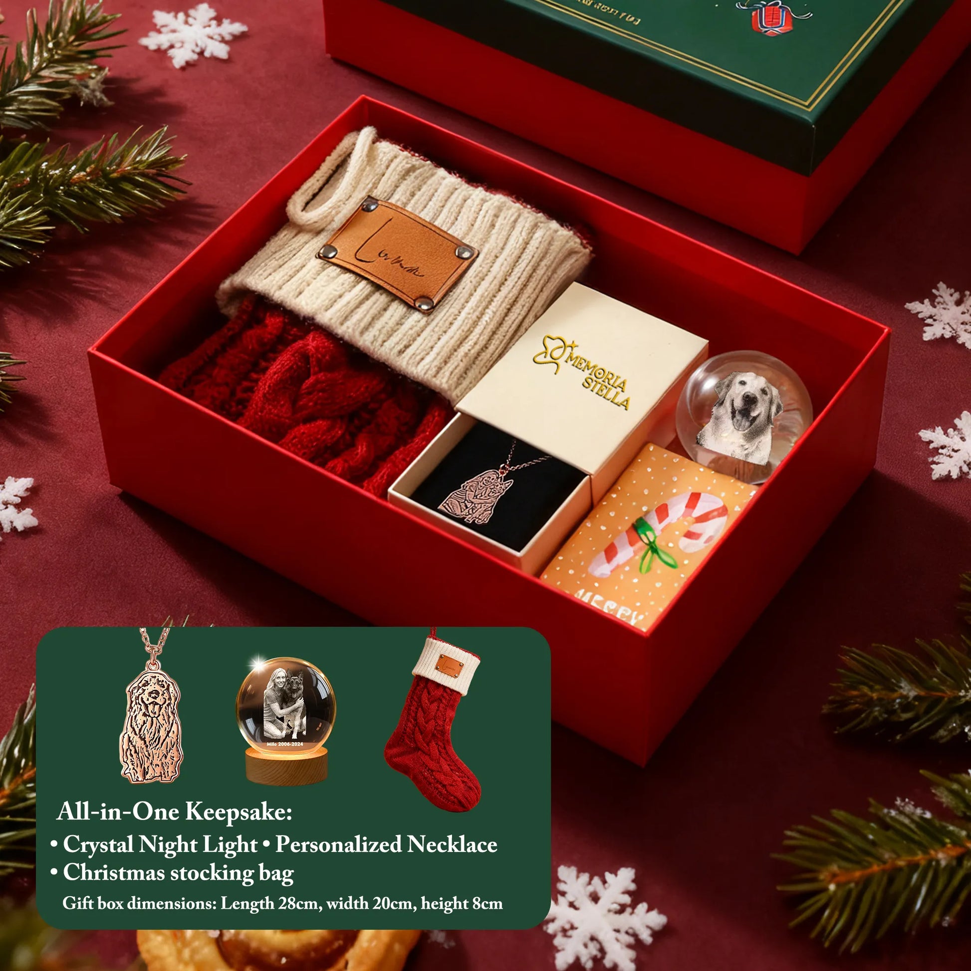 Open Christmas gift box with green lid and contents: crystal night light, pet necklace, stocking, brooch
